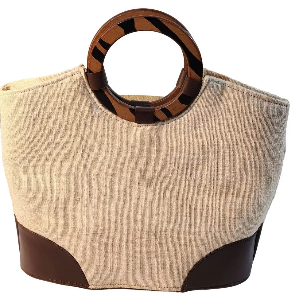 Beige Woven Handbag With Brown Accent at Bottom and Brown Decorative Wood handle